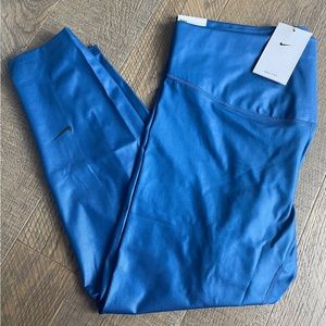 Nike Women’s Plus Tight Fit Mid Rise 7/8 Length